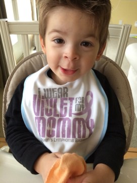 Noah supporting mommy with his bib.